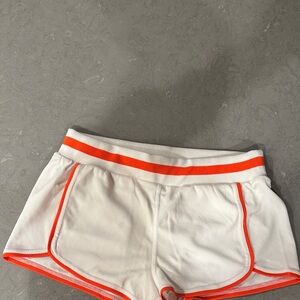 FP Movement by Free People White Shorts with Orange Accents
